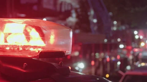 Closer dusk flashing lights of firetrucks Stock Footage 346107130