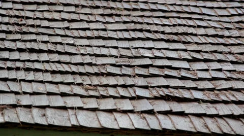 Closer image of the dirty wooden shake roof in pine Stock Footage 32242064