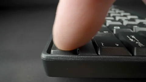 Closer look of the black keyboard on the table Stock Footage 147000913