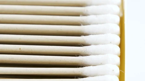 Closer look of the box of cotton buds on the table Stock Footage 129462726