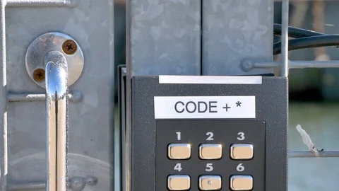 The closer look of the code keys of the gate Stock Footage 115214552