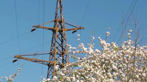 Closer look of the communications tower with the electric wires Stock Footage 138610440