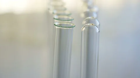 Closer look of the empty glass long test tubes Video stock 128552566