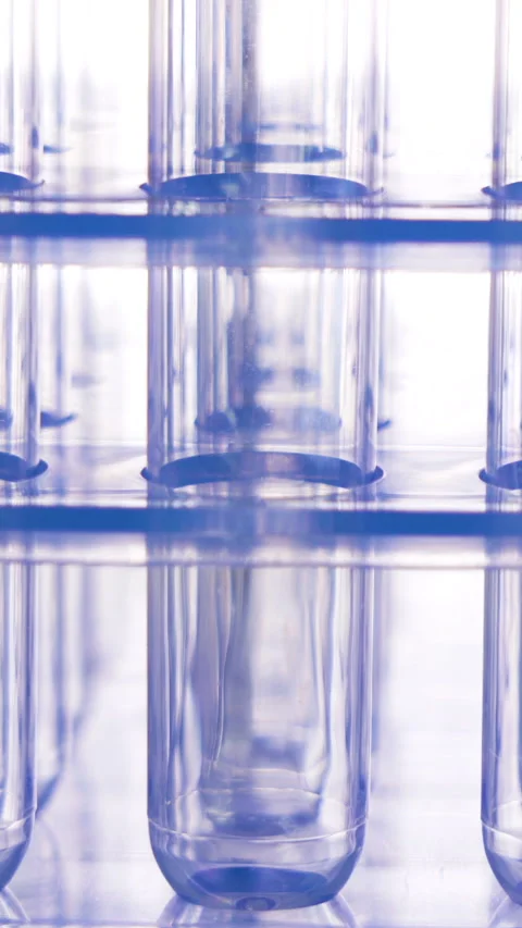 A closer look of the empty long test tubes in vertical video Video stock 150771396