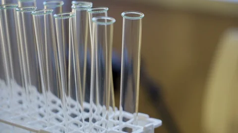 Closer look of the empty tubes on the rack Video stock 127467844