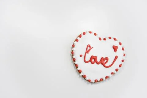 Closer look at the ginger cookie with sugar layer and word Love Stock Photos
