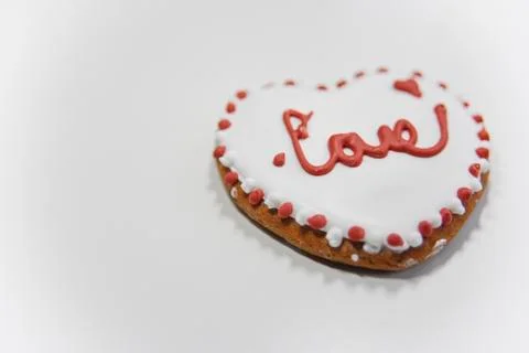 Closer look at the ginger cookie with sugar layer and word Love Stock Photos