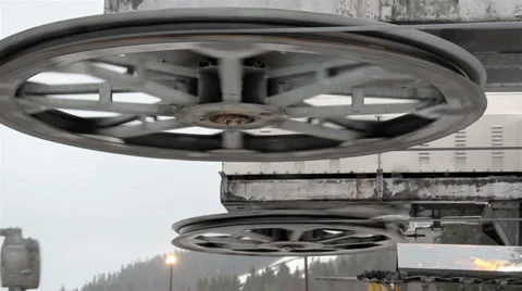 Closer look of huge roller pulleys Stock Footage