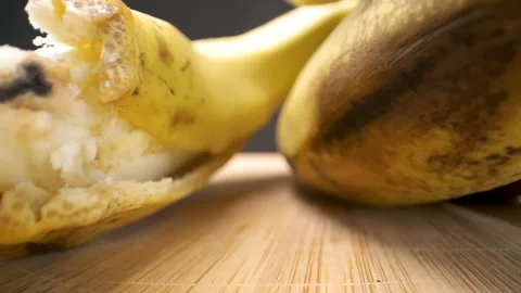 A closer look of the open banana fruit on the table Stock Footage 135704591