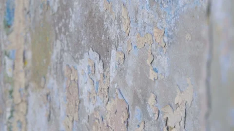 Closer look of the peeling paint from the wall Stock Footage 139852429
