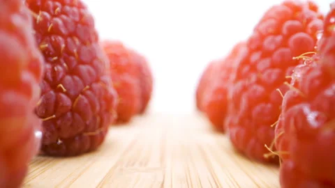 Closer look of the raspberry fruits on the table Stock Footage 135699754