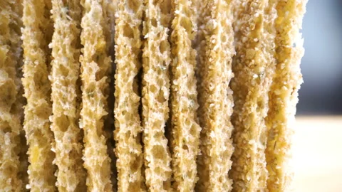 Closer look of the rough side of the bread crispies Stock Footage 135695027