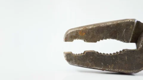 Closer look of the rusty pliers on the table Stock Footage 129455485