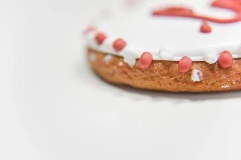 Closer look at the side of ginger cookie with sugar layer and word Love Stock Photos