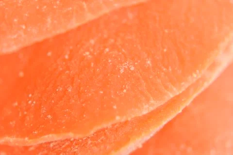 Closer look at the structure of dried and candied mango slice Stock Photos