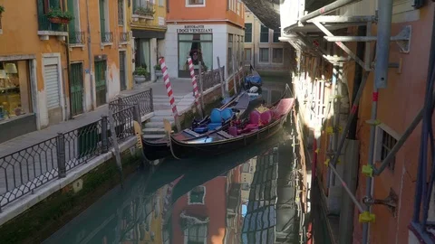 Closer look of the two gondolas on the canal in Venice Italy Stock Footage 82847663