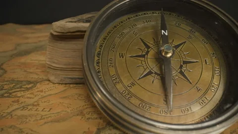 The closer look of the vintage compass on the table Stock Footage 147259094