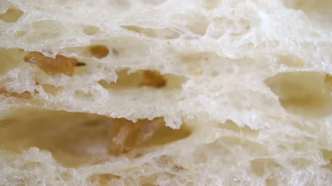 A closer look of the white part of the bread Stock Footage 135693686