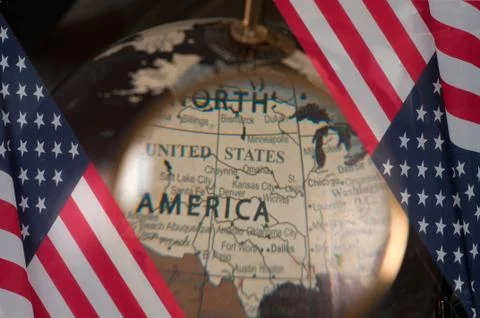 Closer look on world map under magnifying glass Stock Photos
