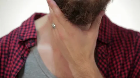 Closer portrait of man touching his perfect beard Stock Footage 252598706