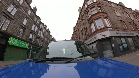 Closer shot of driver going through city Stock Footage 137547248