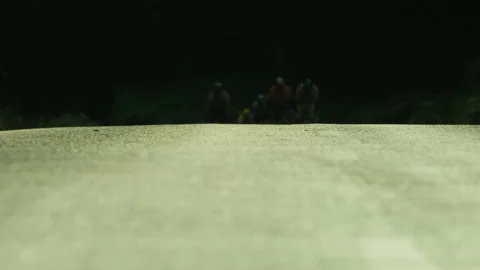 CLOSER VERS. - PACK OF CYCLISTS RIDING TOWARDS CAMERA - SLOWMO Stock Footage 141279847