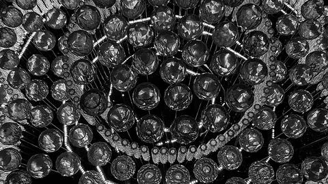 Closer view of a glowing silver light crystal lamp Stock Photos