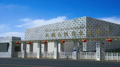 Closer view of patterned museum facade and gold lettering in Tibet Stock Footage 345883373