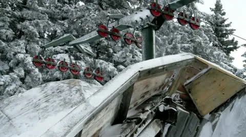 Closer view of snowy cableway in winter time Stock Footage