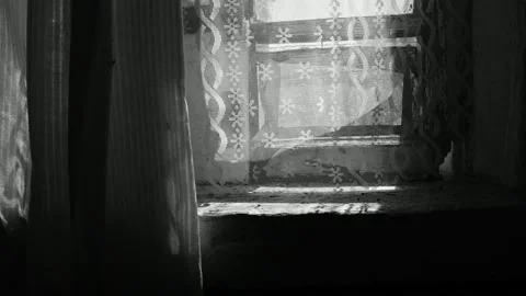 Closes the curtain on the old window Stock Footage 148256232