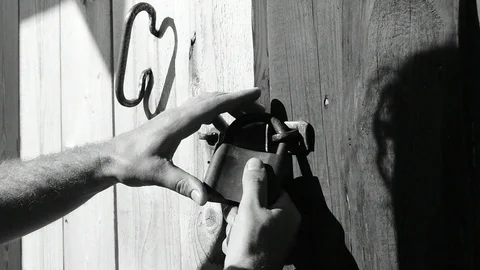 Closes the lock, black and white Stock Footage 110842567