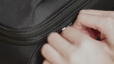 Closes the lock on the suitcase packed for the trip. travel, give to the luggage Stock Footage 239931316