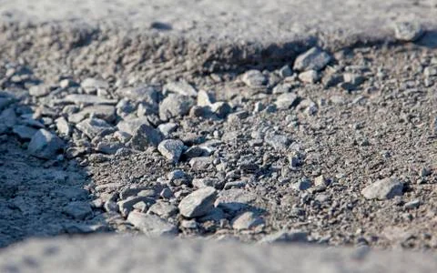 Closeu of a pothole Stock Photos