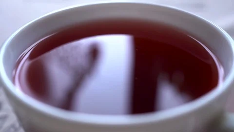 Closeu-up. Stir tea with a spoon 스톡 동영상 73791412