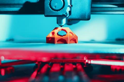 Closeup of a 3D printer during the process of printing a colorful 3D print piece Stock Illustration