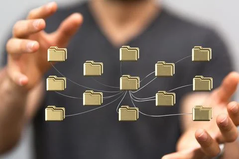 A closeup of a 3d rendered computer files coming from it in the middle of man 스톡 사진