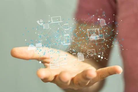 Closeup of 3D rendered figures of technological devices  in a man's hand Stock Photos