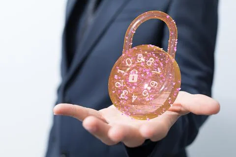 A closeup of 3D rendered lock in a man's palm - security shield,  data protec Stock Photos
