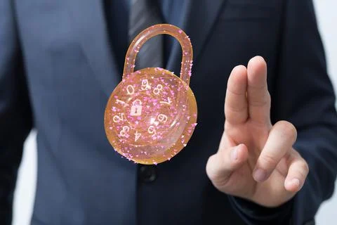 A closeup of 3D rendered lock in a man's hand - security shield, data protect 스톡 사진