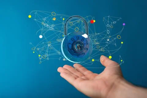 A closeup of 3D rendered lock in a man's hand - security shield, data protect Foto stock