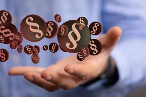 Closeup of 3D rendered paragraph section sign hovering in man’s hand Stock Photos