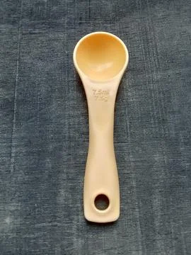 Closeup of 7.5ml measuring spoon. Фото