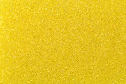 Closeup Abstract background of yellow scrub sponge Stock Photos