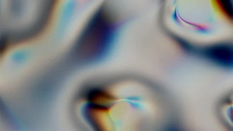 Closeup of Abstract Chromatic fluid waves background. Liquid holographic Video stock 137804309