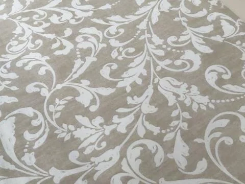 Closeup of abstract gray scroll patterned fabric texture Stock Photos