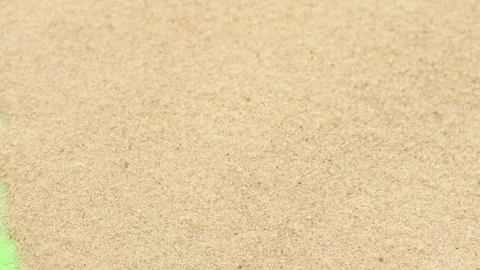Closeup abstract sand transition blowing over green screen chroma key background Stock Footage 254053305