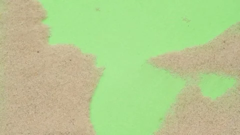 Closeup abstract sand transition blowing over green screen chroma key background Stock Footage 269487875