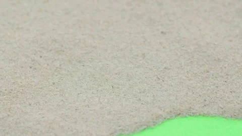 Closeup abstract sand transition blowing over green screen chroma key background Video stock 287545116