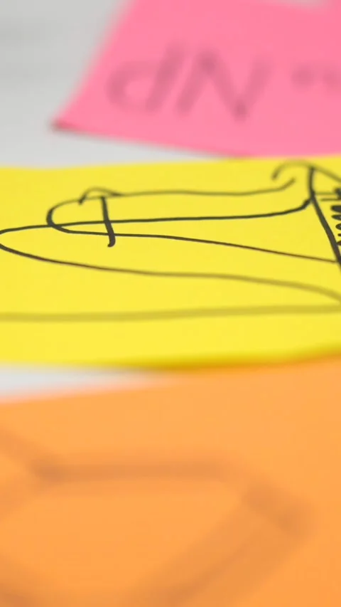 Closeup of adhesive notes on white desk Vídeo Stock 257028552