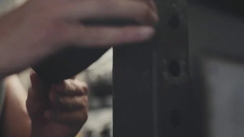 Closeup of adjusting squat rack Stock Footage 76726081